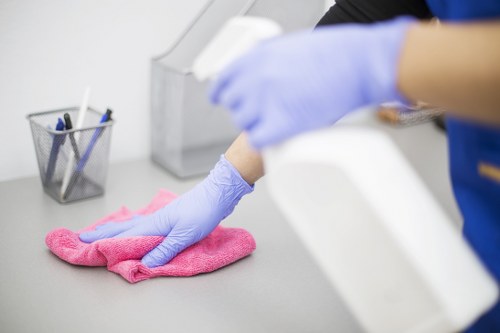 Office cleaners in KT2 working in a modern local workspace