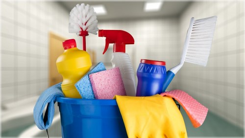 Cleaner preparing carpet cleaning equipment safely