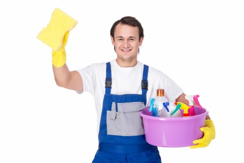 Cleaner maintaining a client-facing office area in Kingston KT2