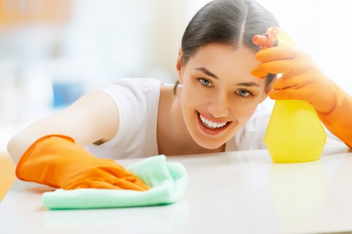 Commercial cleaners maintaining a workspace in KT2