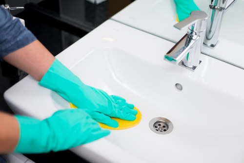 Using protective equipment during professional carpet cleaning