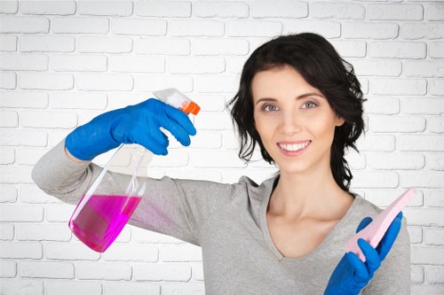 Professional cleaning team working in a KT2 residential property